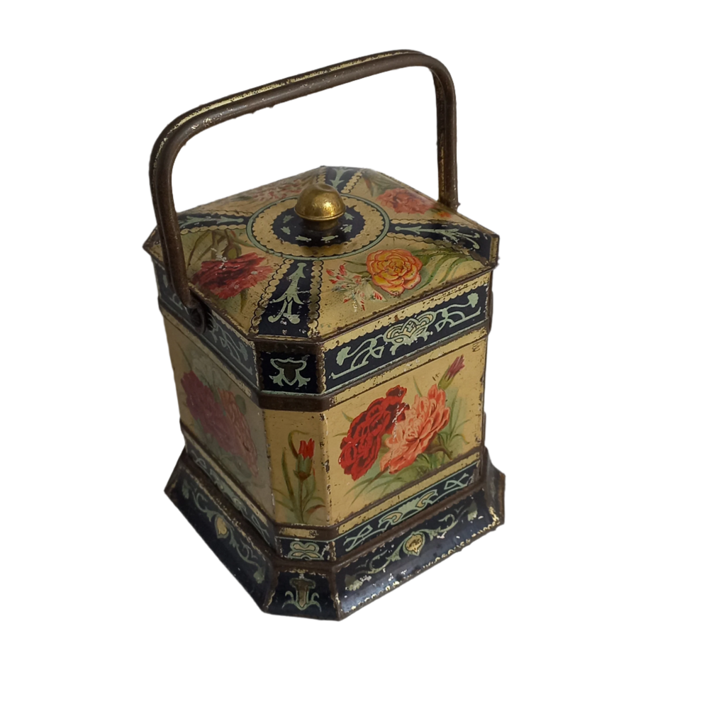 Decorative antique tin box with floral pattern
