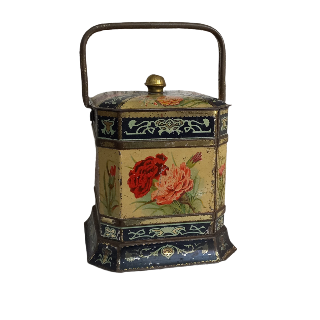Decorative antique tin box with floral pattern