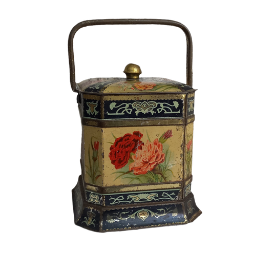 Decorative antique tin box with floral pattern
