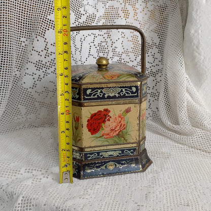 Decorative antique tin box with floral pattern