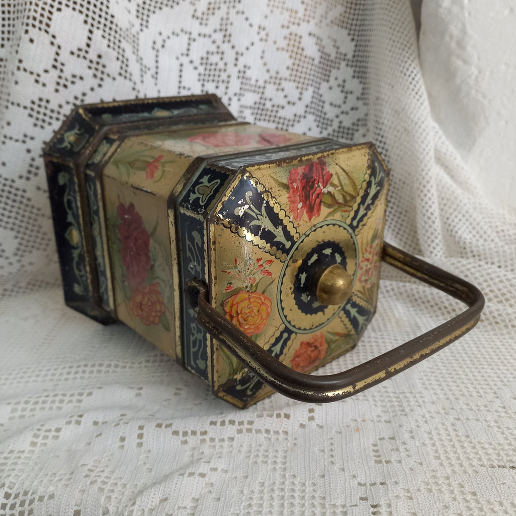 Decorative antique tin box with floral pattern