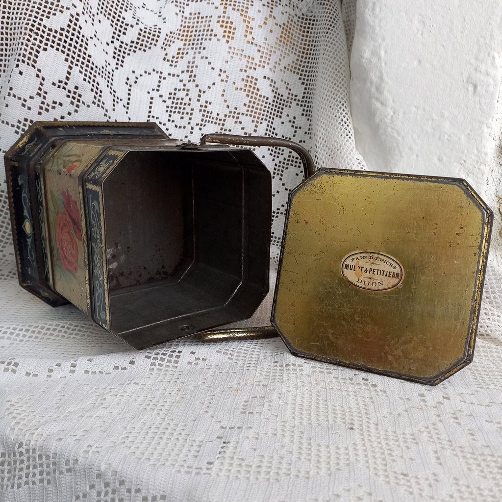Decorative antique tin box with floral pattern