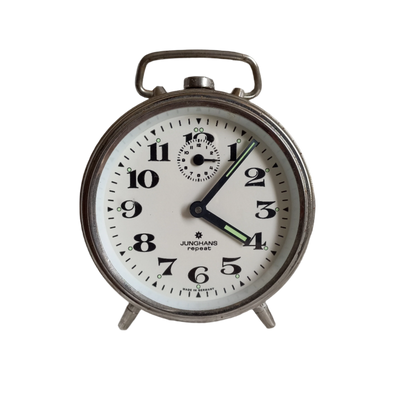 Small mechanical alarm clock with a chrome metal case by German company Junghans, office desk decor,