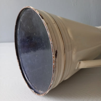 Large antique enamel metal pitcher in cream color with gold trim from France