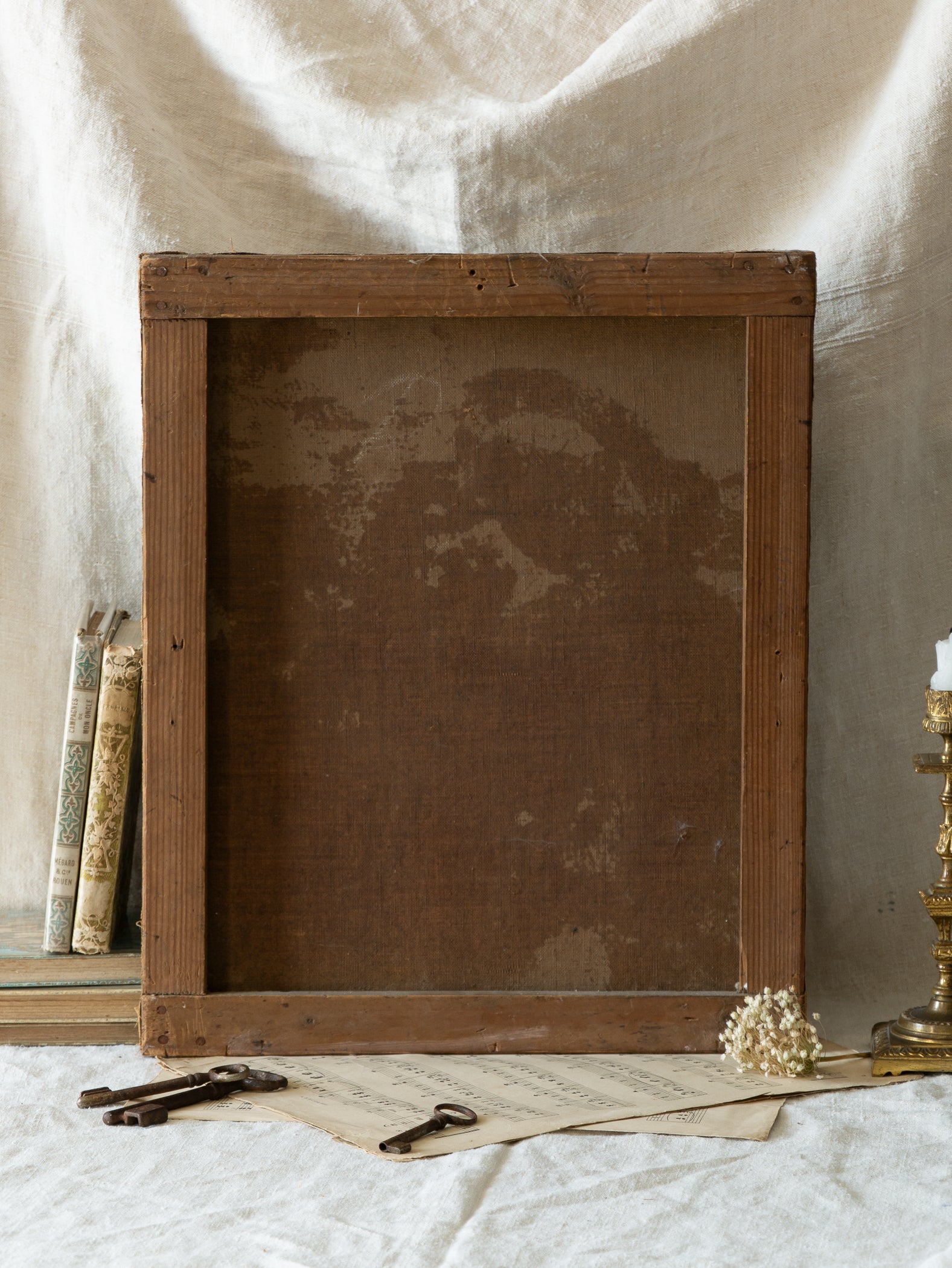 A late 19th-century/early 20th century after Raphael oil painting based on Madonna della Sedia (1513–1514, Pitti Palace, Florence). The artist (perhaps a student of the time) adapts Raphael’s tondo into a rectangular canvas, preserving the iconic green dress with patterned sleeve, the tender embrace, and the young St. John at right against a deep ground.