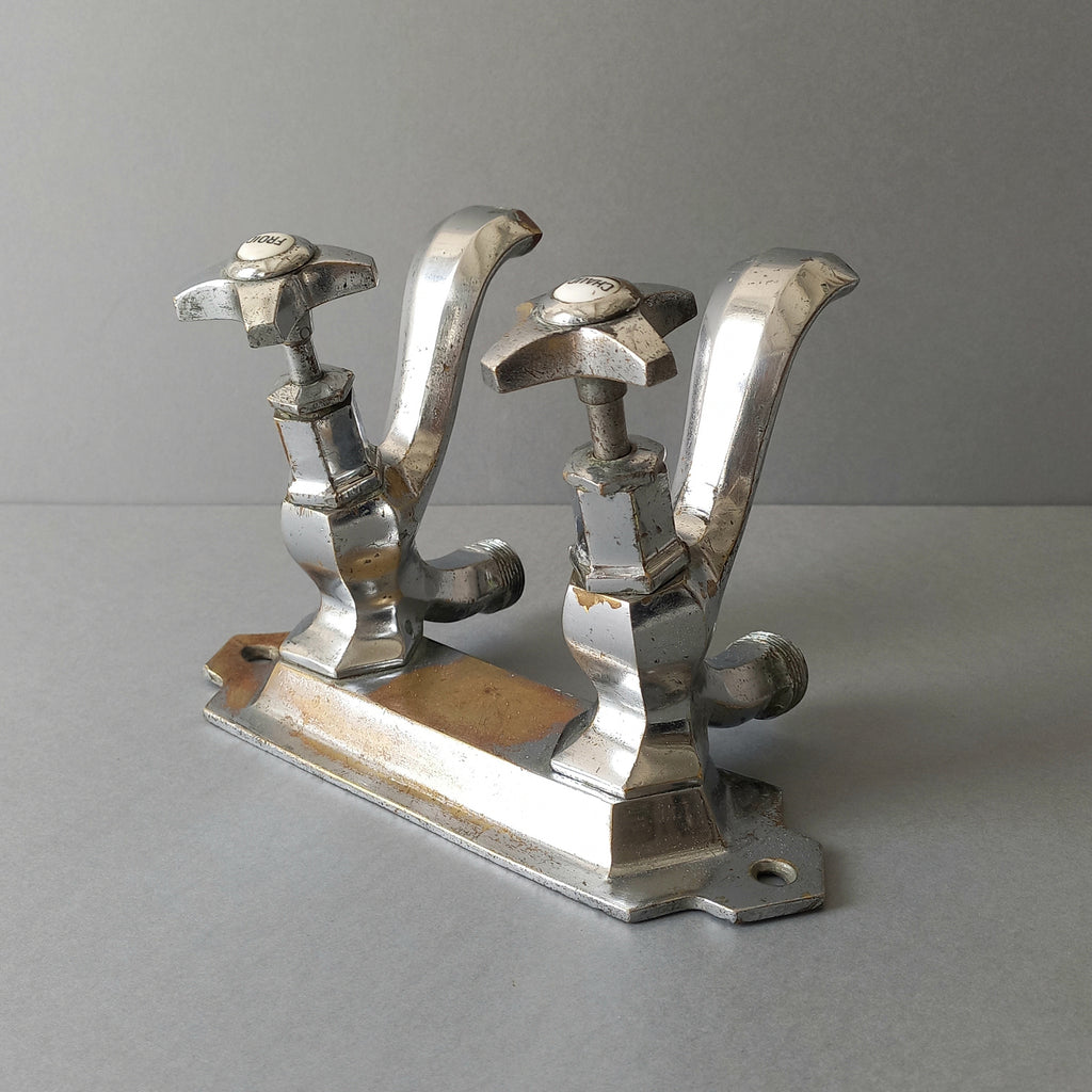 French vintage hot and cold faucet taps that are heavy, quality pieces being sold as a restoration piece or project.