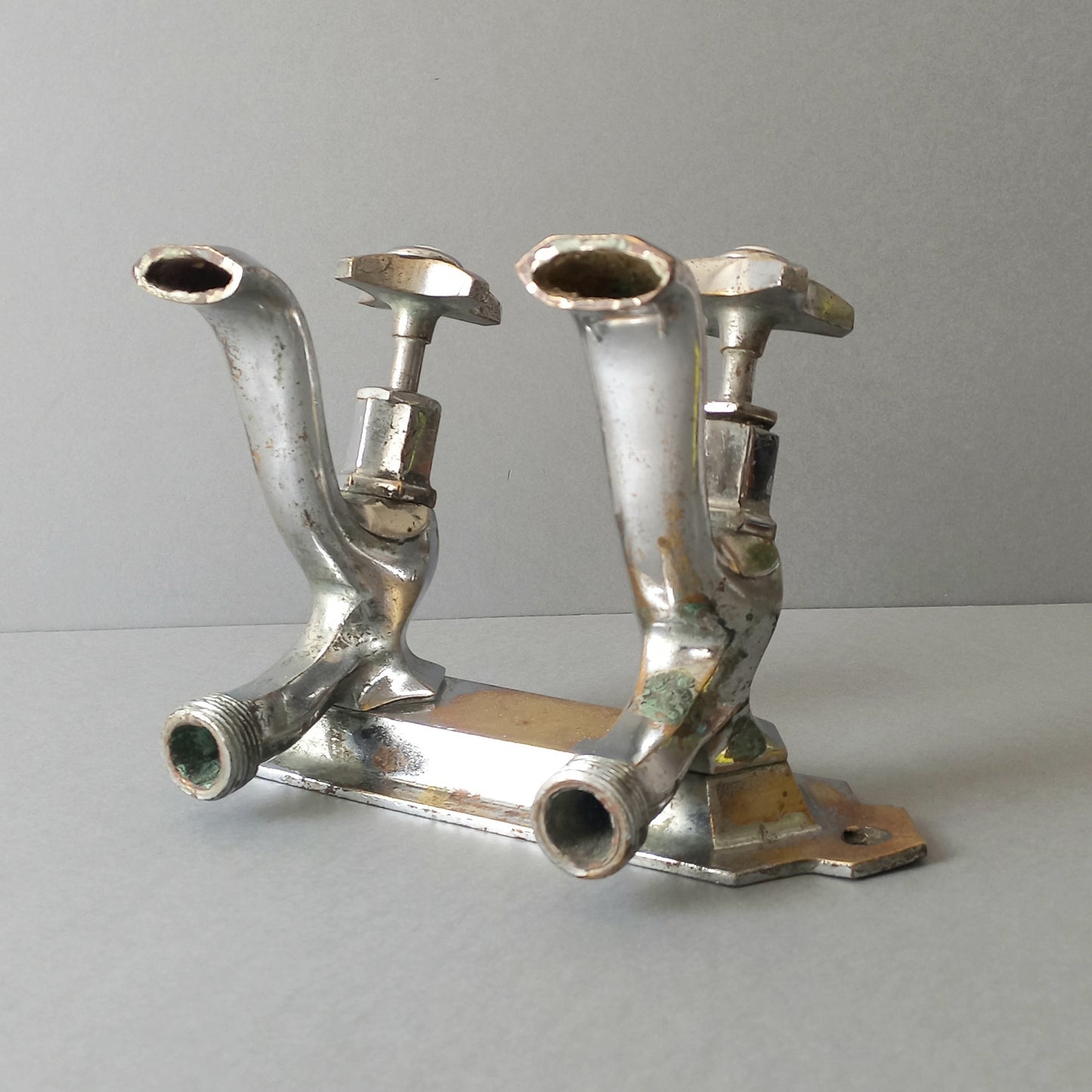 French vintage hot and cold faucet taps that are heavy, quality pieces being sold as a restoration piece or project.