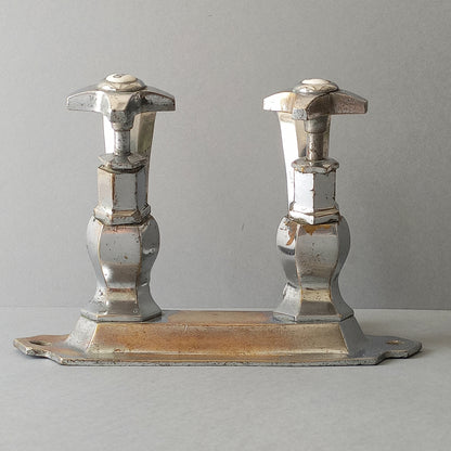 French vintage hot and cold faucet taps that are heavy, quality pieces being sold as a restoration piece or project.