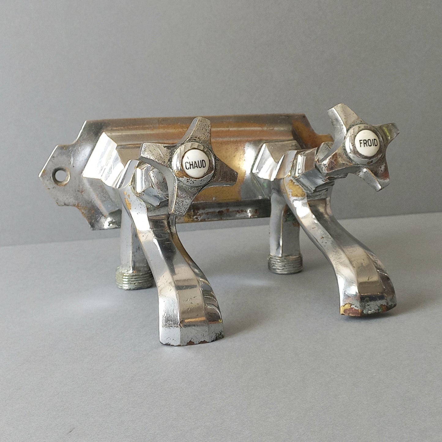 French vintage hot and cold faucet taps that are heavy, quality pieces being sold as a restoration piece or project.