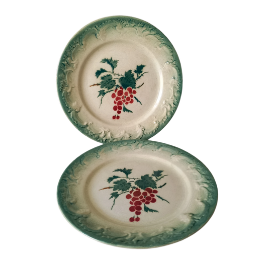 A pair of small French vintage/antique decorative plates with a transfer pattern called 'Fruits'. These plates are a lovely time-worn white/cream with green leaf and red berry transfer pattern; around the circumference is an attractive decoration in relief. The maker's mark is Faïencerie de Castres who closed their factory in 1936, so these pieces are early 20th century. In summary, wonderful old plates from France which will make super display pieces.