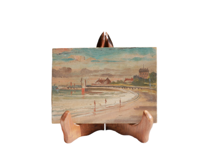 A beautiful pair of small coastal beach paintings on little wooden boards. Each original painting is wonderfully rendered with delightful and moody colours. The artist has signed one painting.

These original pieces of art look great displayed against a wall or on a mantelpiece, etc, and would also look equally nice on miniature easels as seen in two of our photos, or framed and on the wall - many possibilities!
