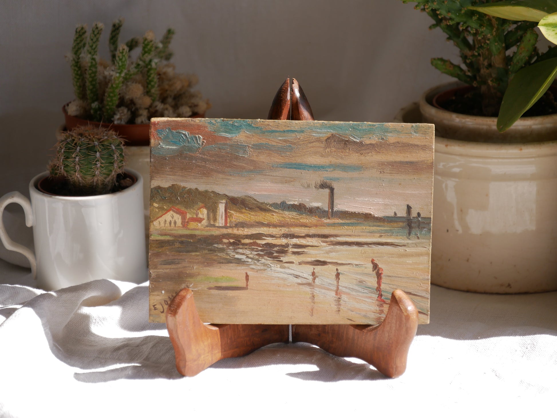 A beautiful pair of small coastal beach paintings on little wooden boards. Each original painting is wonderfully rendered with delightful and moody colours. The artist has signed one painting.

These original pieces of art look great displayed against a wall or on a mantelpiece, etc, and would also look equally nice on miniature easels as seen in two of our photos, or framed and on the wall - many possibilities!