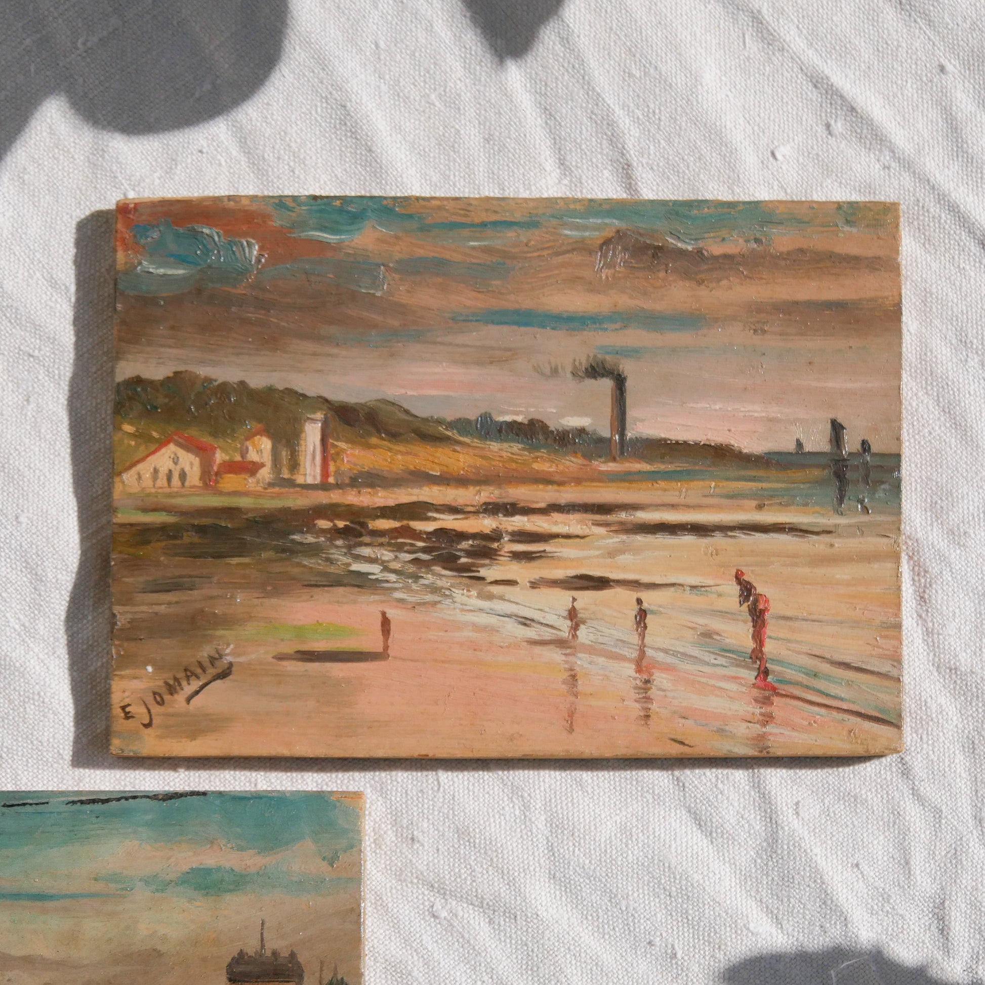A beautiful pair of small coastal beach paintings on little wooden boards. Each original painting is wonderfully rendered with delightful and moody colours. The artist has signed one painting.

These original pieces of art look great displayed against a wall or on a mantelpiece, etc, and would also look equally nice on miniature easels as seen in two of our photos, or framed and on the wall - many possibilities!