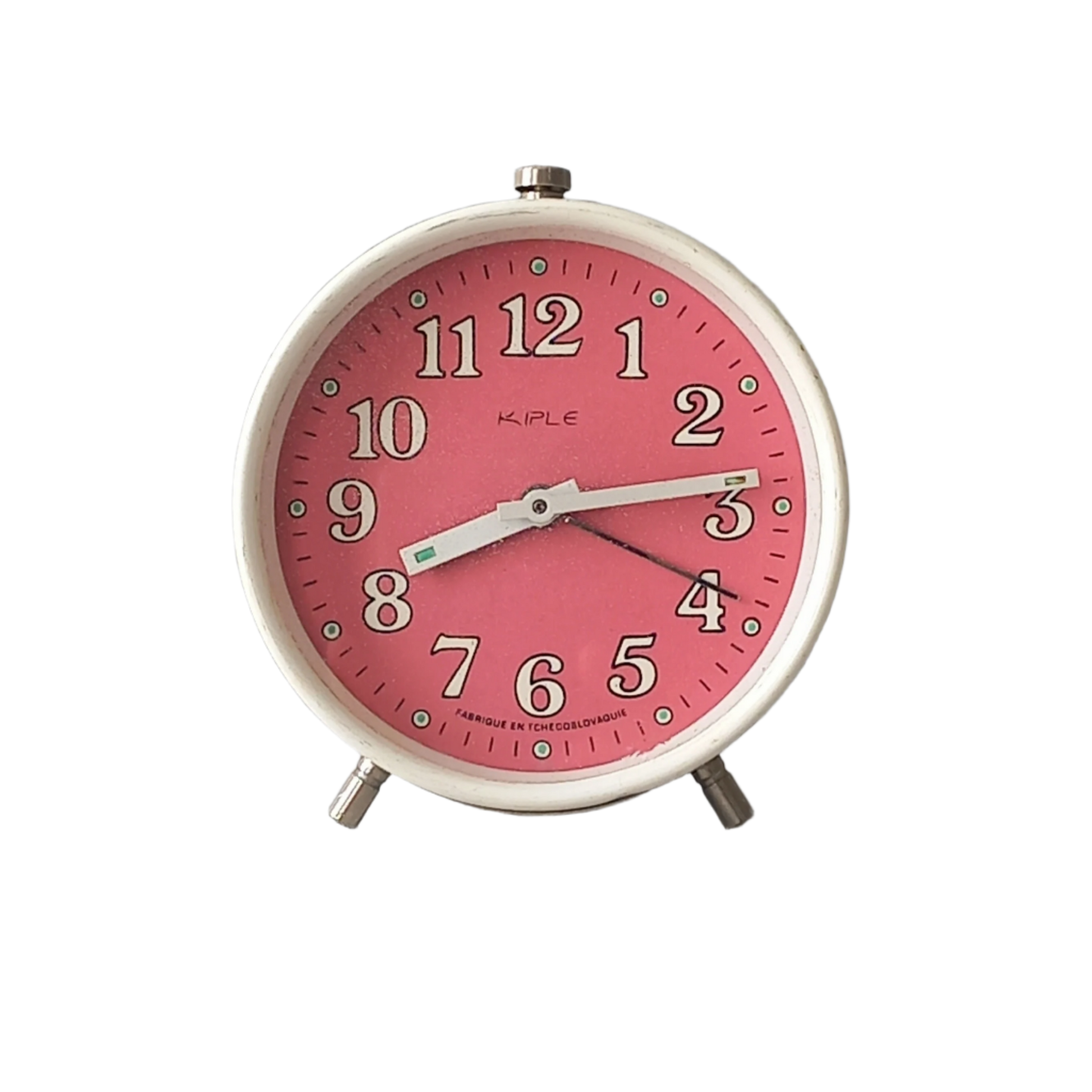 A vintage alarm clock in an eye-catching white and pink color scheme. This old clock is in working condition including the alarm and has a nice soothing ticking sound too. A great piece of European history from the former country of Czechoslovakia.

In summary, a nice vintage alarm clock!