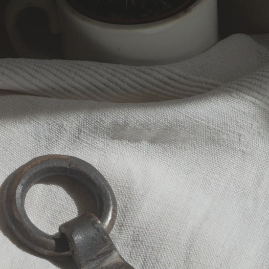 An interesting French antique artisan made Crucifix made from iron and painted black. On one side the metal has worn away in places giving this piece a pleasing patina of age. There's a hanging loop so it's ready to hang in your home.

We guesstimate this piece to be over 100 years old.