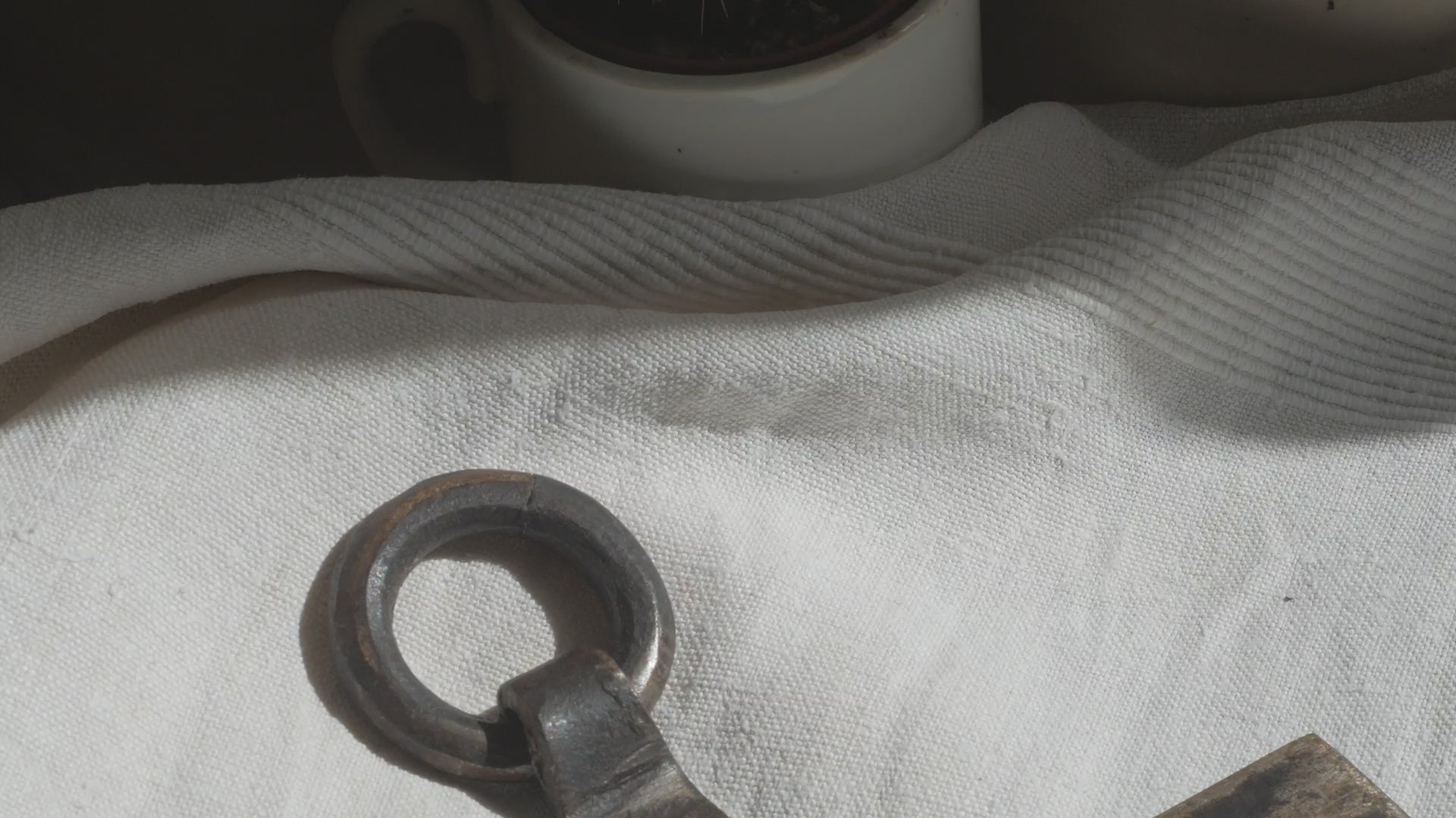 An interesting French antique artisan made Crucifix made from iron and painted black. On one side the metal has worn away in places giving this piece a pleasing patina of age. There's a hanging loop so it's ready to hang in your home.

We guesstimate this piece to be over 100 years old.