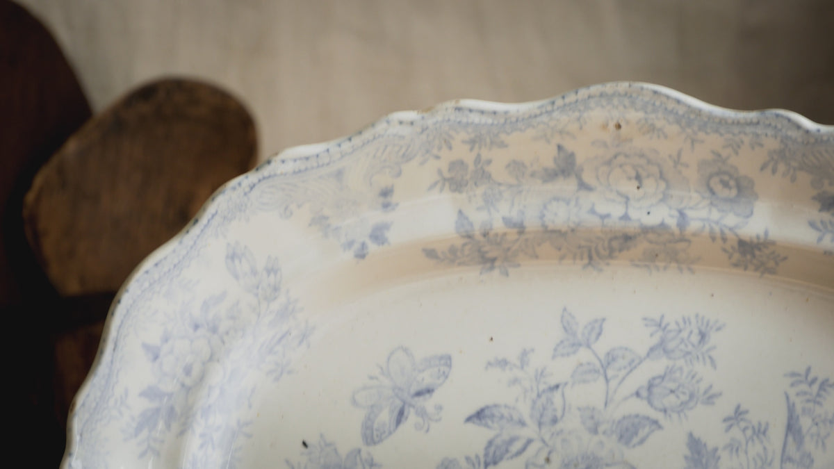 Elegant antique white ironstone platter with pale blue Asiatic Pheasants floral design. A large antique plate perfect for farmhouse kitchens, cottage decor, or blue and white china collections.