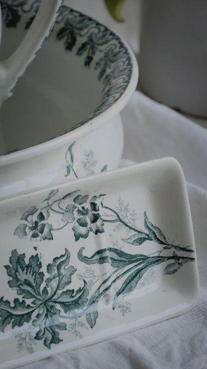 A French antique ironstone jug, basin and soap dish, printed in a soft teal-green bird-and-floral pattern. 