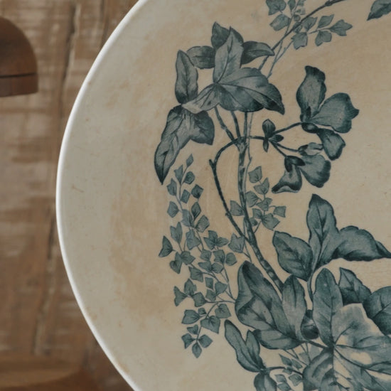 An absolutely stunning large French antique oval ironstone serving plate in a delightful time-worn creamy white with blue transferware pattern depicting two cute birds and flowers. 