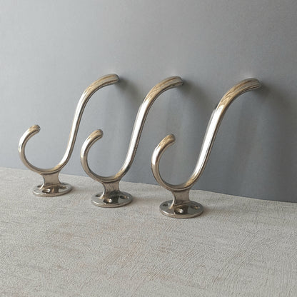 3 x French vintage silver coloured metal coat hooks in used sturdy used condition. Good for coat storage, dog leads, or maybe in the kitchen or bathroom for towels.
Circa. 1930s/1950s.