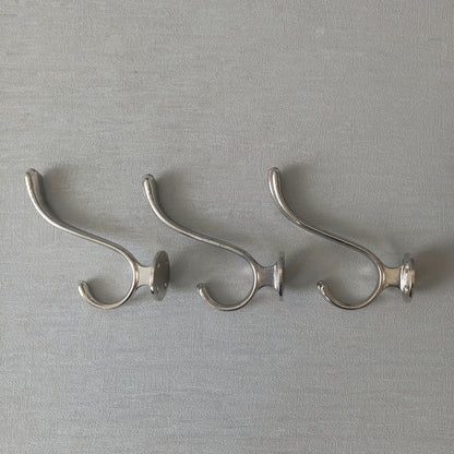 3 x French vintage silver coloured metal coat hooks in used sturdy used condition. Good for coat storage, dog leads, or maybe in the kitchen or bathroom for towels.
Circa. 1930s/1950s.