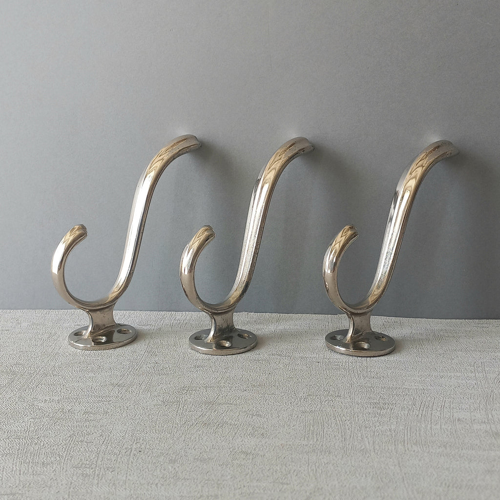 3 x French vintage silver coloured metal coat hooks in used sturdy used condition. Good for coat storage, dog leads, or maybe in the kitchen or bathroom for towels.
Circa. 1930s/1950s.