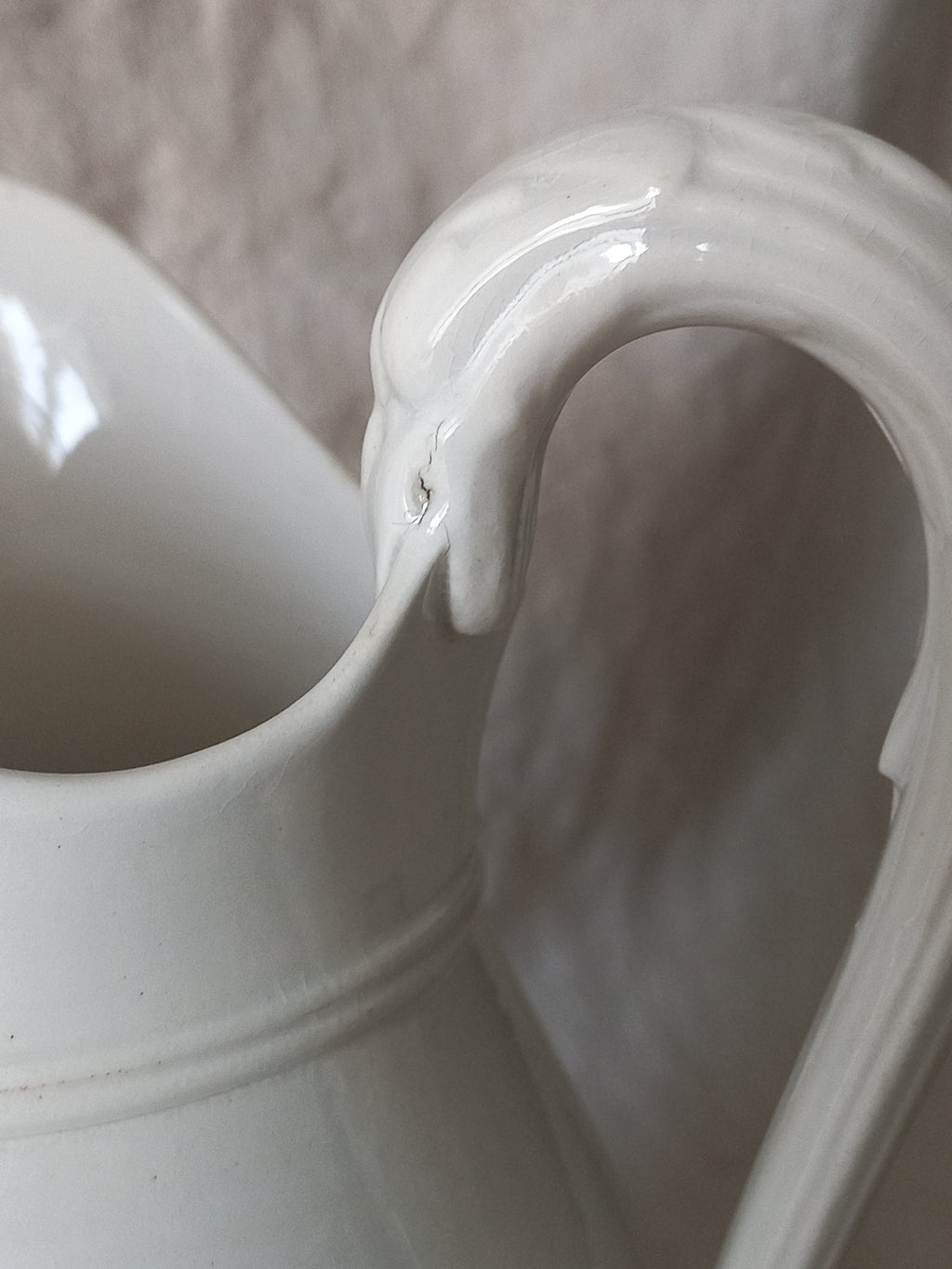 Small antique white ironstone/earthenware jug by premier French manufacturer, Sarreguemines.