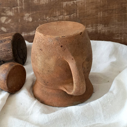 A little antique stoneware jug with a glazed interior in a wonderful shade of ochre, so rustic! This piece of pottery has aged beautifully and with its uneven worn edges and earthy rough texture it's perfect for a rustic, country or farmhouse interior.