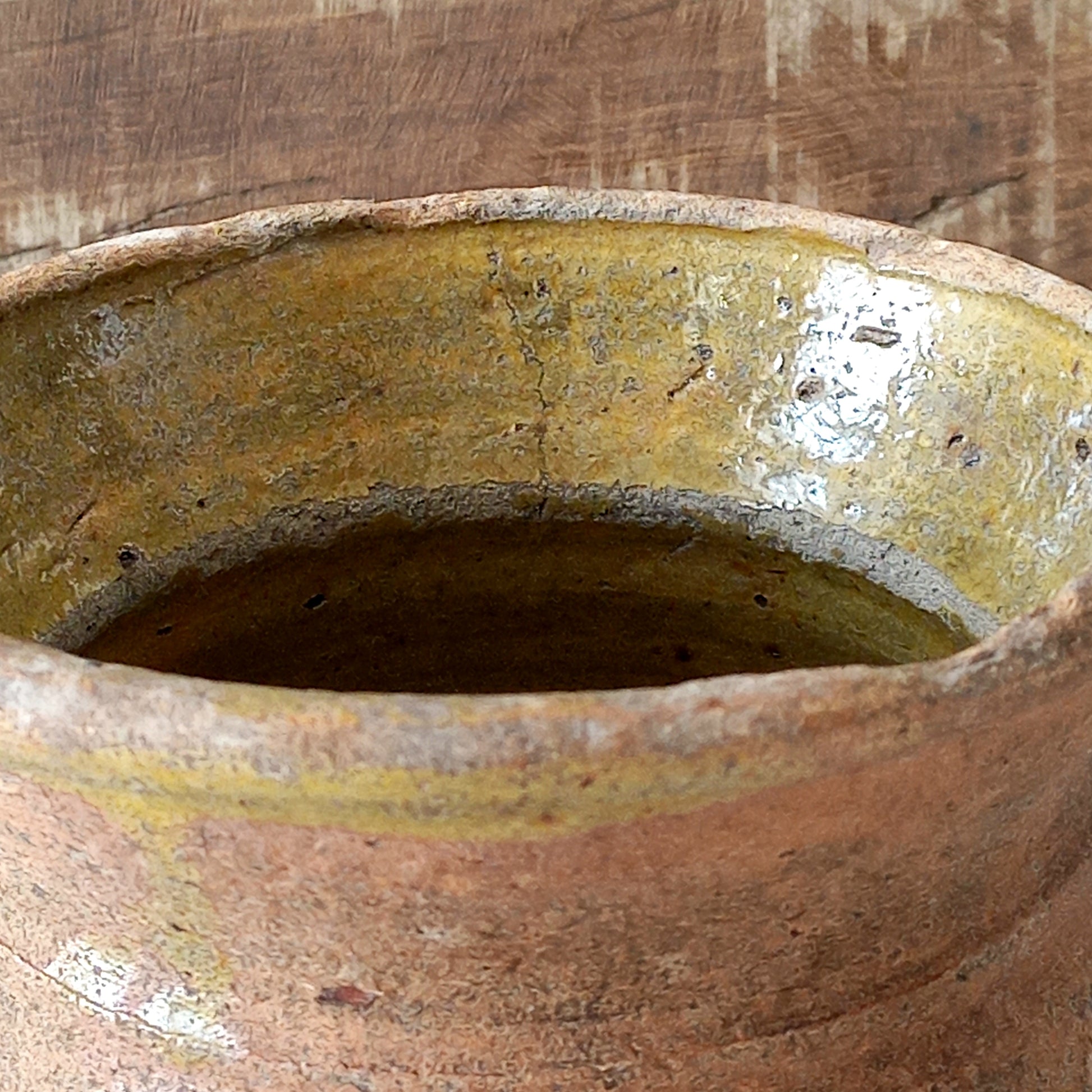 A little antique stoneware jug with a glazed interior in a wonderful shade of ochre, so rustic! This piece of pottery has aged beautifully and with its uneven worn edges and earthy rough texture it's perfect for a rustic, country or farmhouse interior.
