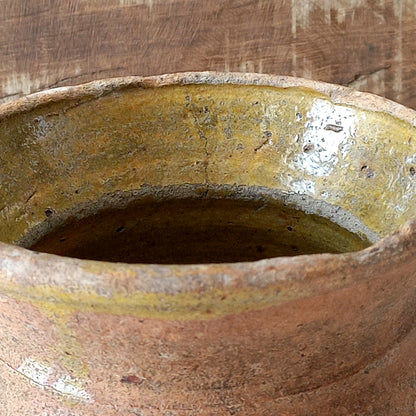 A little antique stoneware jug with a glazed interior in a wonderful shade of ochre, so rustic! This piece of pottery has aged beautifully and with its uneven worn edges and earthy rough texture it's perfect for a rustic, country or farmhouse interior.