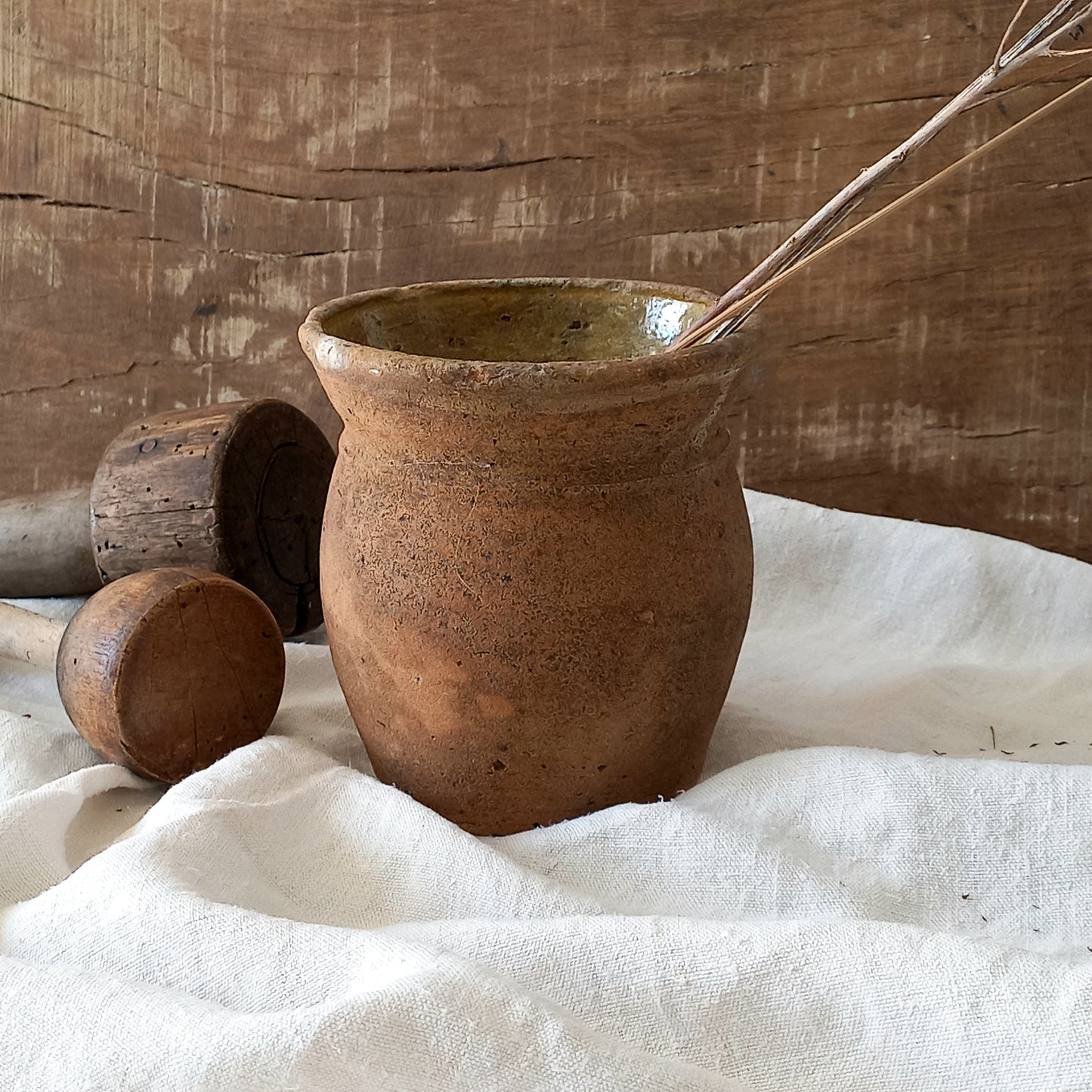 A little antique stoneware jug with a glazed interior in a wonderful shade of ochre, so rustic! This piece of pottery has aged beautifully and with its uneven worn edges and earthy rough texture it's perfect for a rustic, country or farmhouse interior.