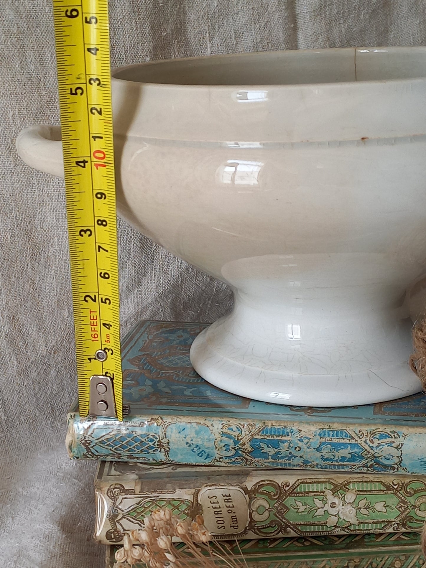 White ironstone bowl with a tape measure for reference.