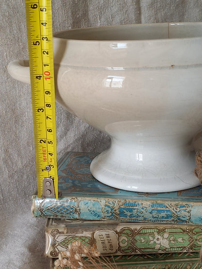 White ironstone bowl with a tape measure for reference.