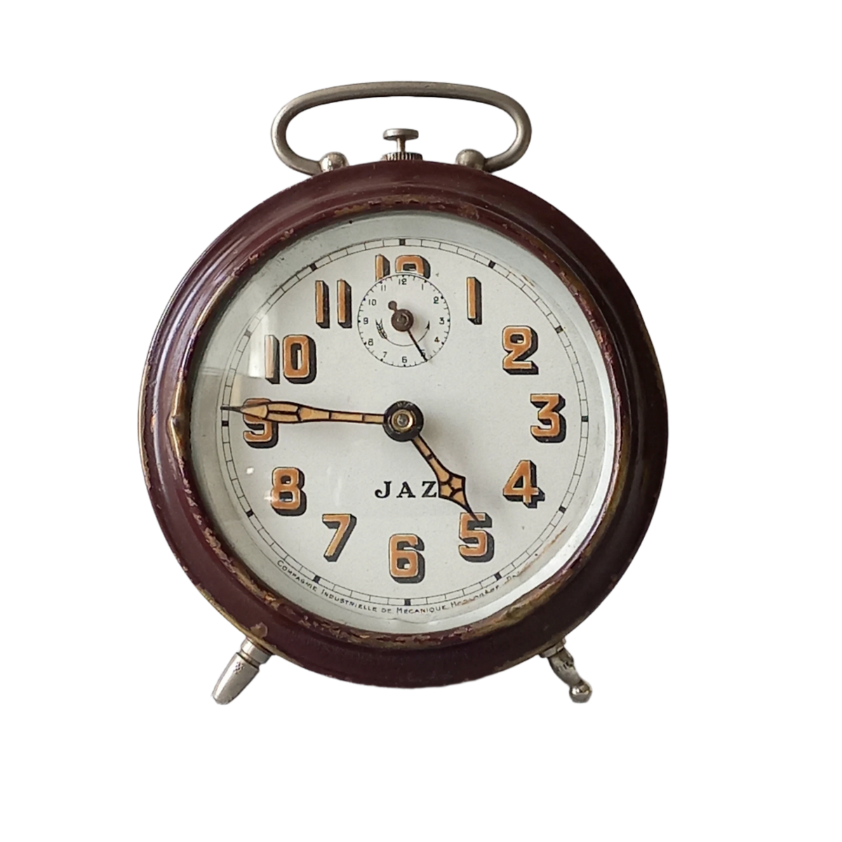 A handsome little vintage alarm clock by premier French manufacturer, Jaz.

This wonderful little clock is in semi-working condition including the alarm, although I should note that being an old time piece dating from the pre-1940 period he's temperamental and sometimes will just stop working, although all that's needed is a gentle shake from side to side and he will once more begin to tick - sometimes you might have to repeat this and have patience with him.