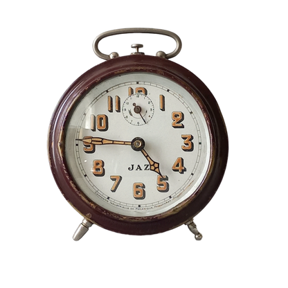 A handsome little vintage alarm clock by premier French manufacturer, Jaz.

This wonderful little clock is in semi-working condition including the alarm, although I should note that being an old time piece dating from the pre-1940 period he's temperamental and sometimes will just stop working, although all that's needed is a gentle shake from side to side and he will once more begin to tick - sometimes you might have to repeat this and have patience with him.