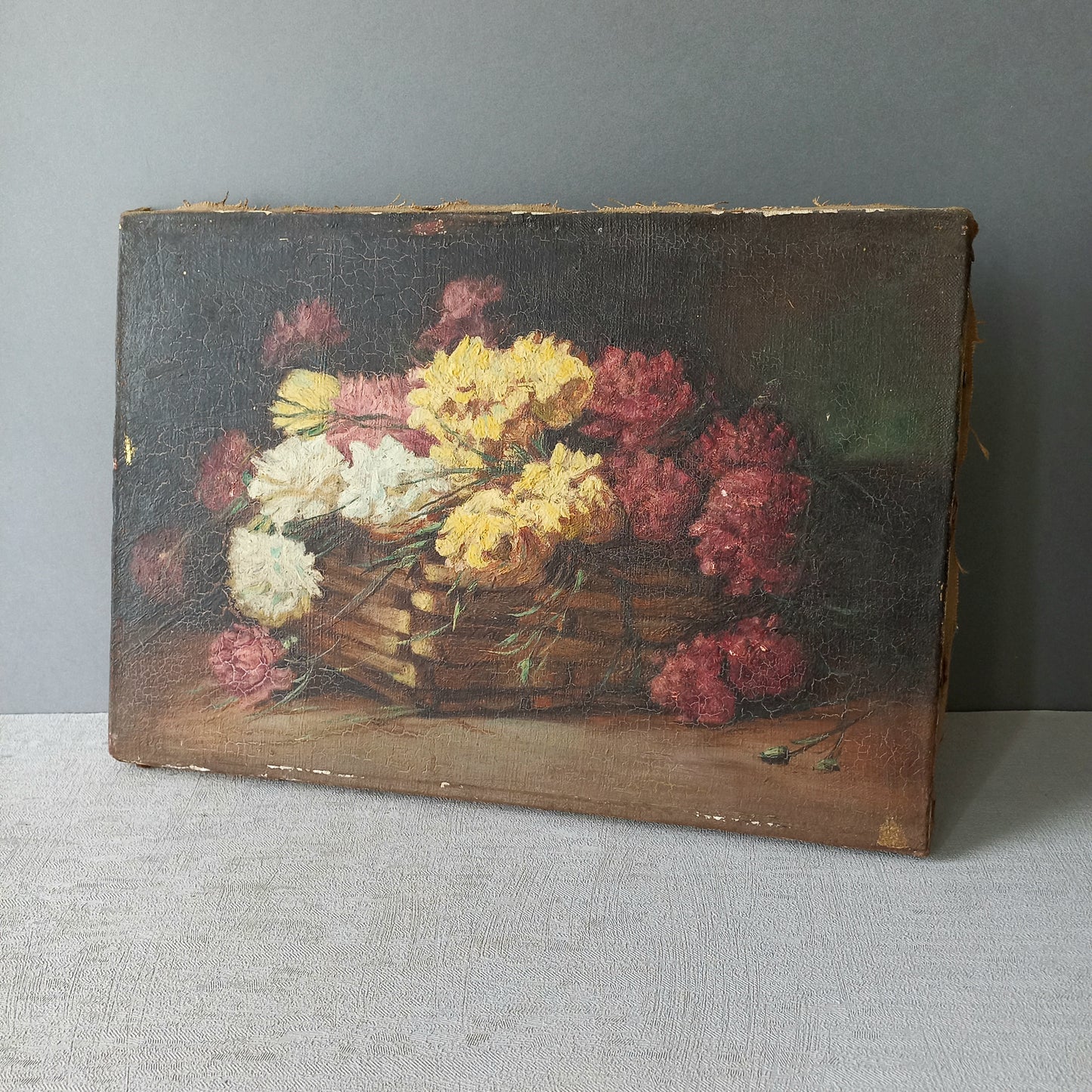 A stunning little French antique floral oil painting, really wonderfully painted with confident brush strokes. This piece is very old as you can see, especially when you view the rear of the canvas - there's a little label to the rear with a Paris mark - probably where the canvas originated.

In summary, beautiful and original antique art from France.
