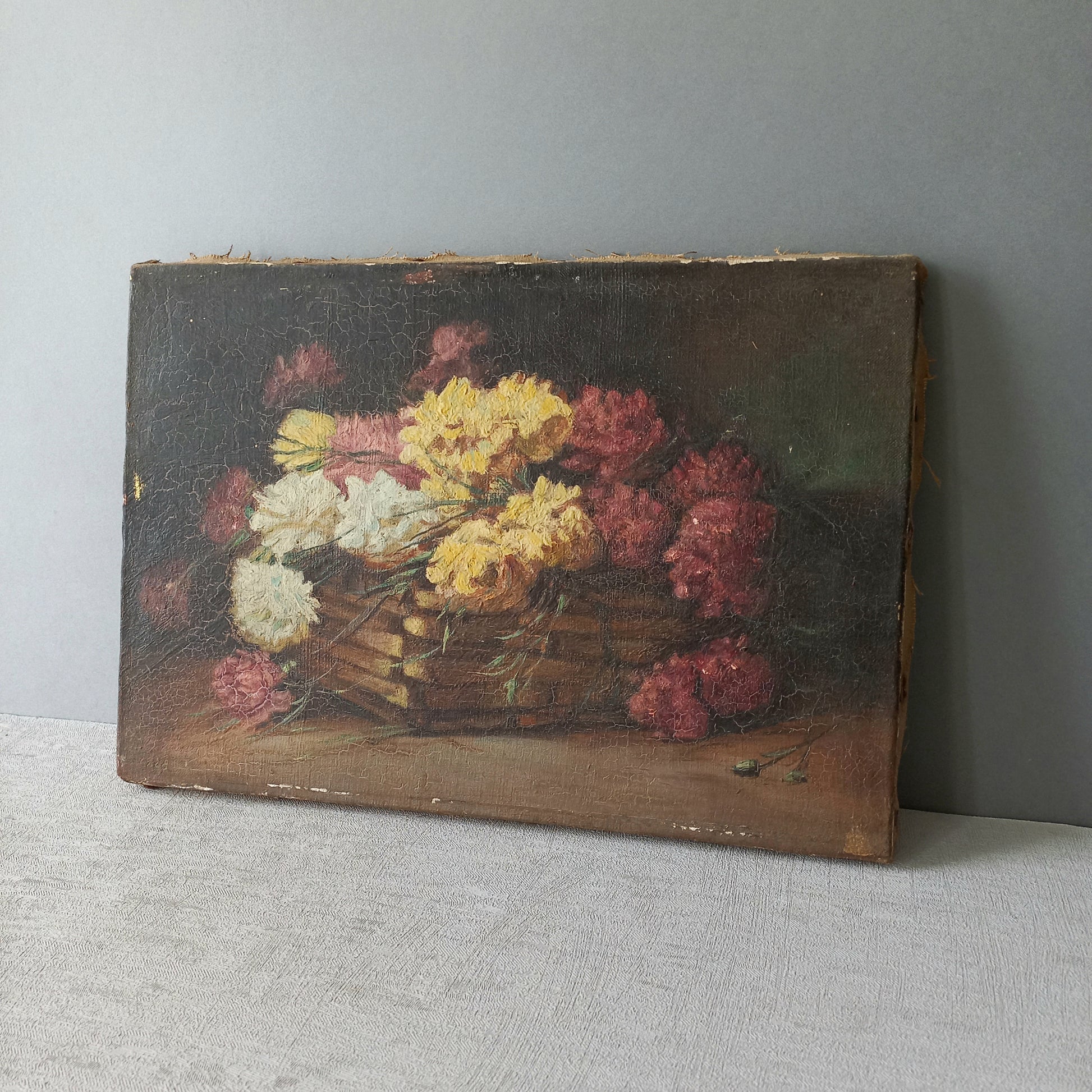 A stunning little French antique floral oil painting, really wonderfully painted with confident brush strokes. This piece is very old as you can see, especially when you view the rear of the canvas - there's a little label to the rear with a Paris mark - probably where the canvas originated.

In summary, beautiful and original antique art from France.