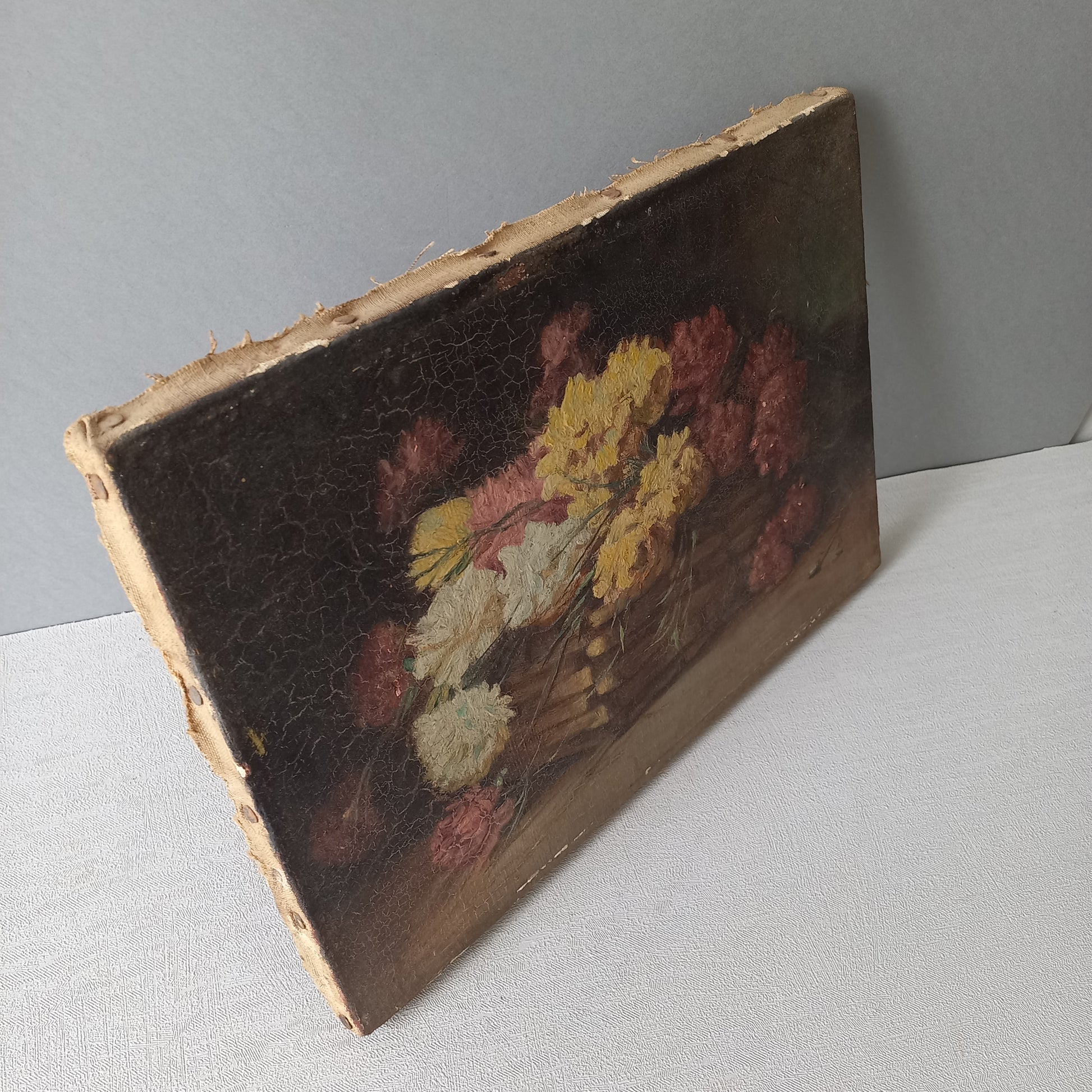 A stunning little French antique floral oil painting, really wonderfully painted with confident brush strokes. This piece is very old as you can see, especially when you view the rear of the canvas - there's a little label to the rear with a Paris mark - probably where the canvas originated.

In summary, beautiful and original antique art from France.