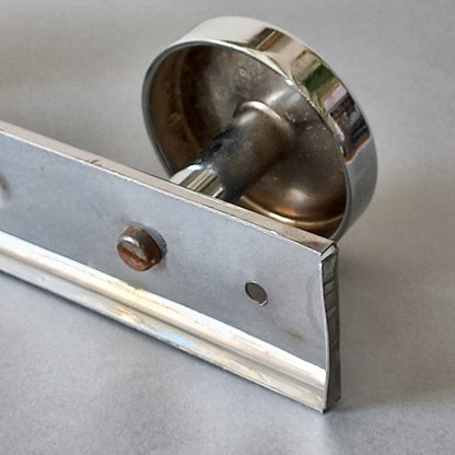 A stylish French vintage 4 peg metal coat rack with a polished finish, a great piece of practical wall decor for your home.