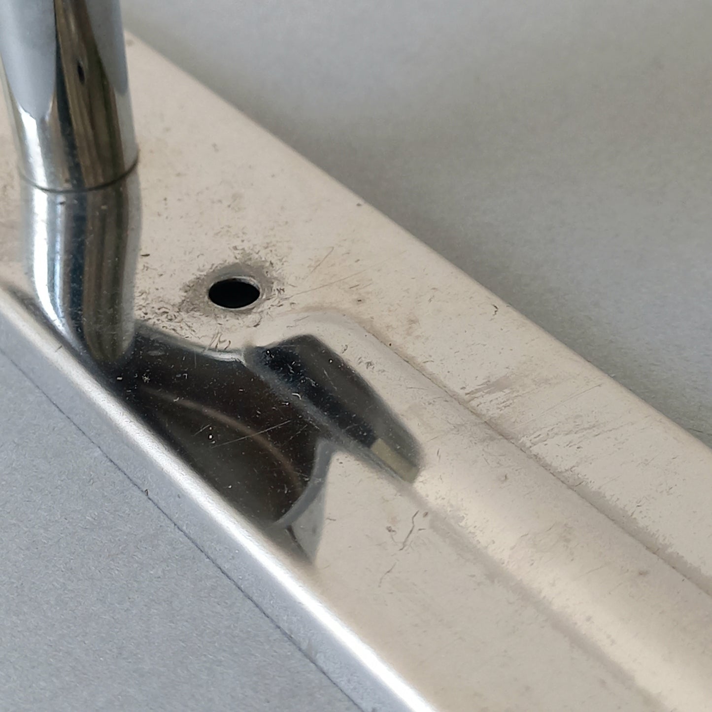 A stylish French vintage 4 peg metal coat rack with a polished finish, a great piece of practical wall decor for your home.