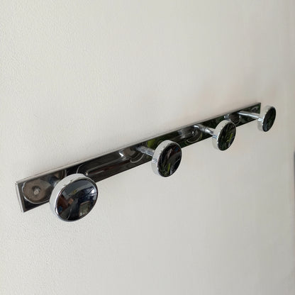 A stylish French vintage 4 peg metal coat rack with a polished finish, a great piece of practical wall decor for your home.