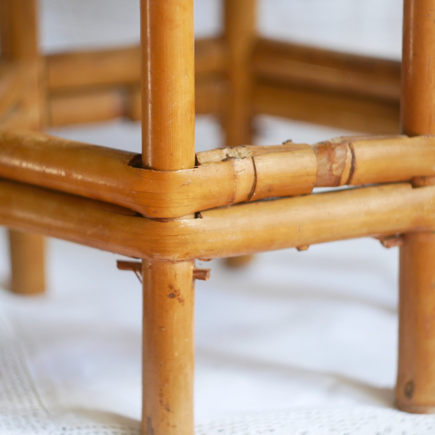 An attractive vintage bamboo pedestal which makes a wonderful plant stand. The pedestal is both solid and sturdy and can be used for many decorative purposes such as displaying plants, ornaments, dolls, etc.