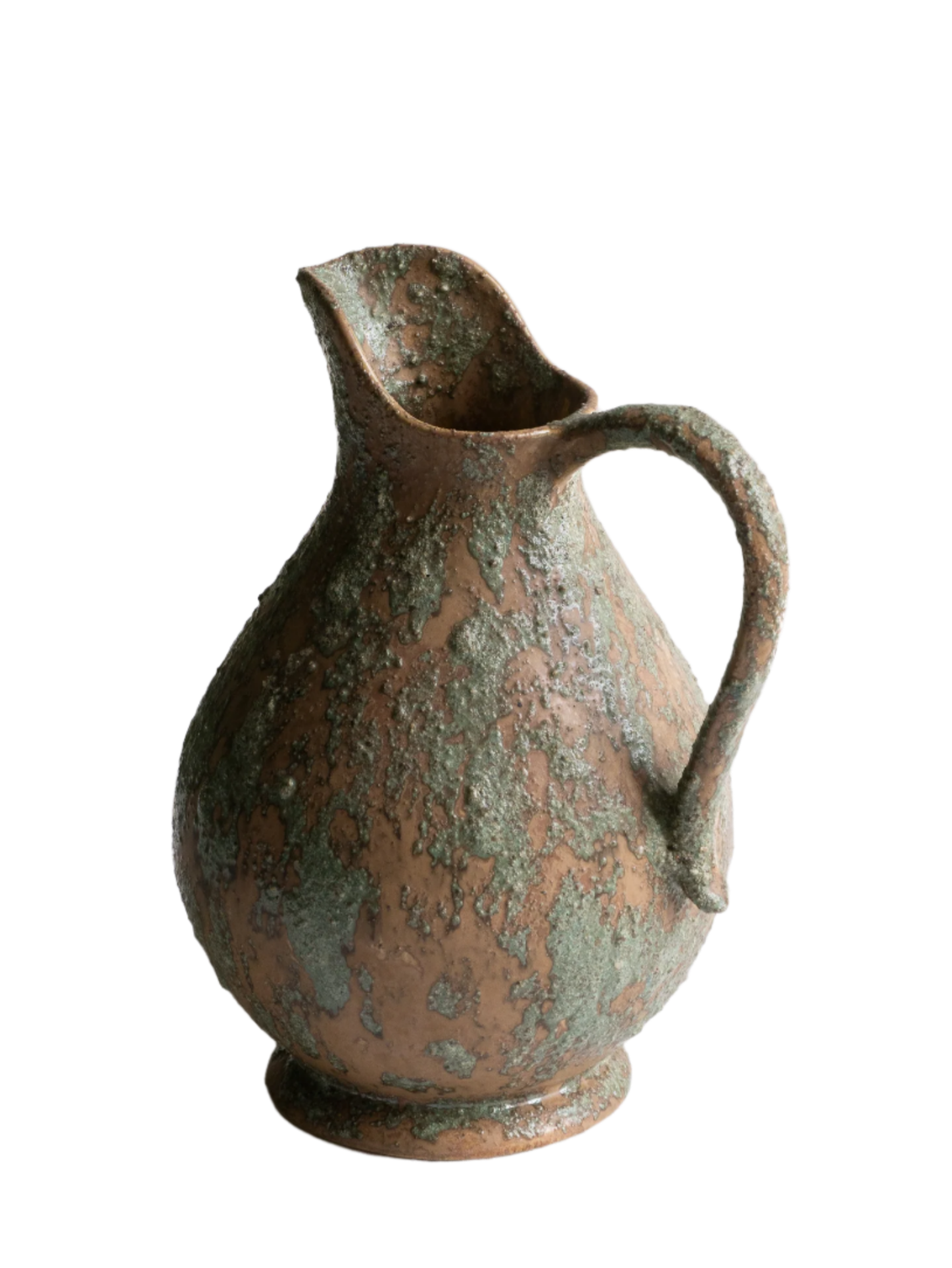 An artisan-made vintage pottery pitcher or jug that purchased in south west France. This piece is wonderful in its earthy tones of brown with a green pattern in relief all over the pitcher and would make a great piece of home decor or addition to a pottery/stoneware collection.