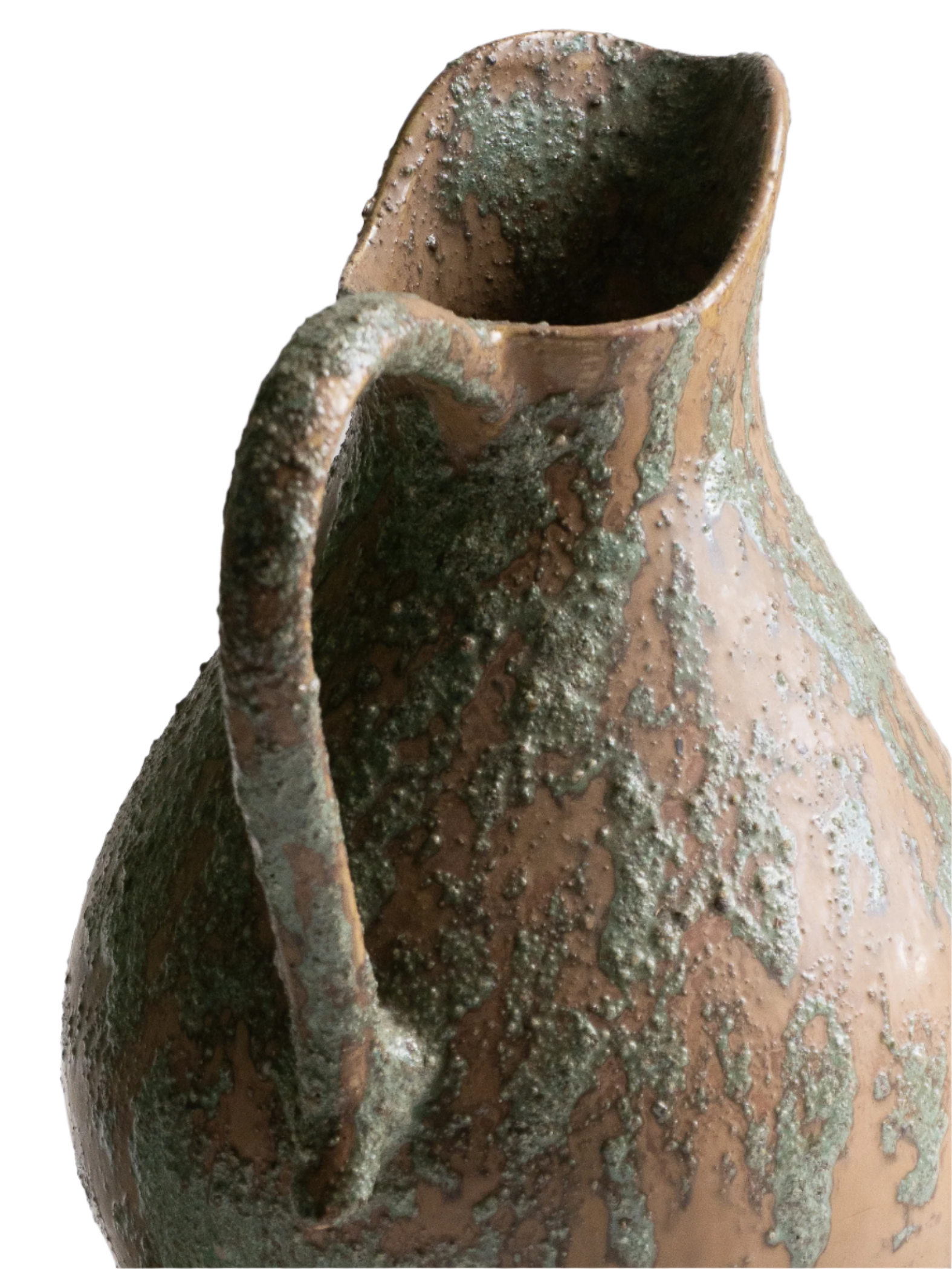 An artisan-made vintage pottery pitcher or jug that purchased in south west France. This piece is wonderful in its earthy tones of brown with a green pattern in relief all over the pitcher and would make a great piece of home decor or addition to a pottery/stoneware collection.