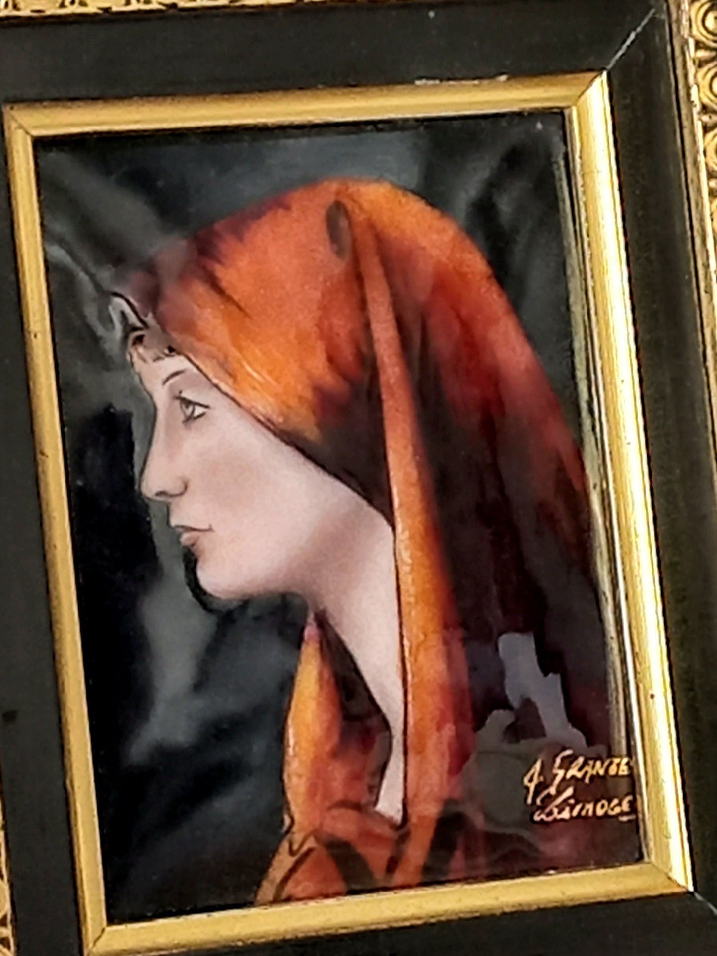 A French vintage religious enamel Saint Fabiola portrait painting by Limoges of France. The religious figure has been hand-painted in enamels on copper and signed by the artist. The art is presented in a dark brown frame with a label to the rear that tells us it's a genuine hand-made enamel artwork.