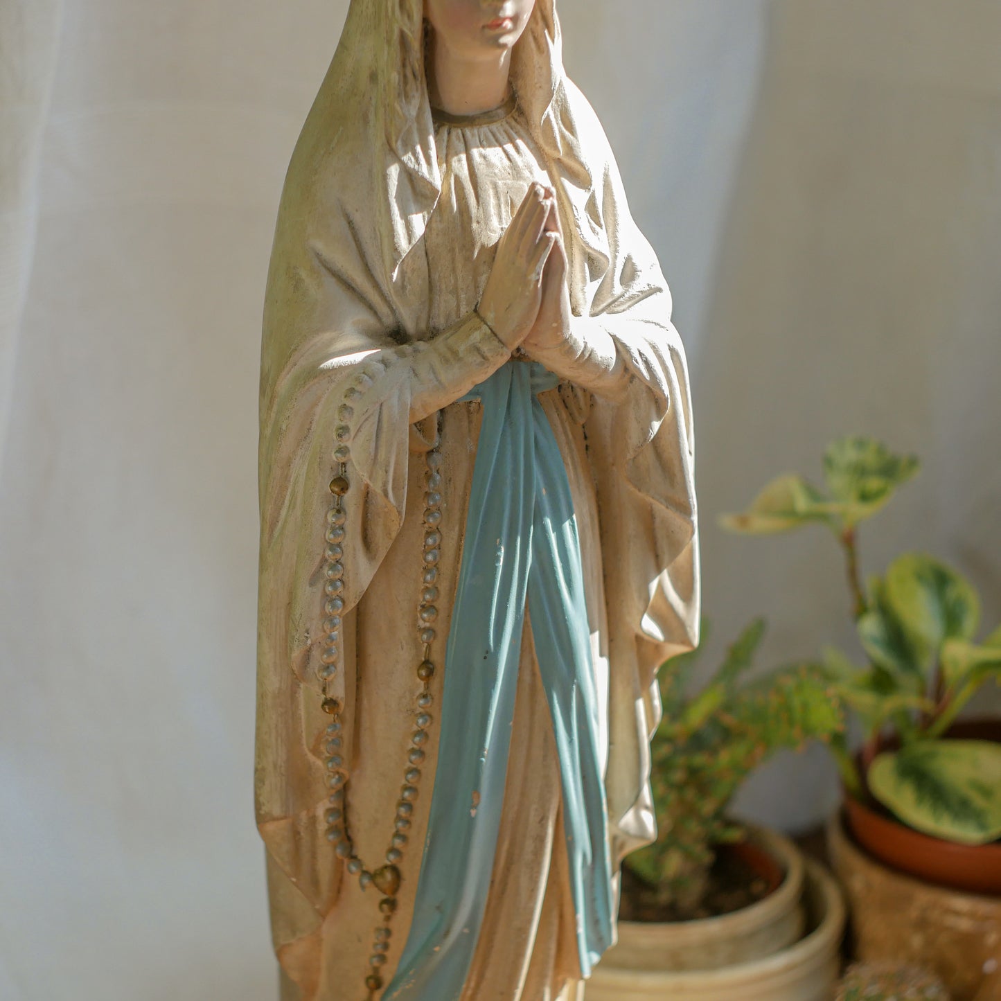 A large and stunning French vintage/antique religious Madonna figurine with wonderful subtle and time-faded coloring, a hard to find piece in this wonderful condition which has just the right amount of aging. This beautiful statue makes excellent religious decor in any home.