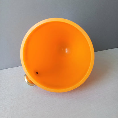 A French vintage Veuve Clicquot thick plastic champagne cooler in a wonderful shade of vibrant yellow-orange. Veuve Clicquot are from Reims, France (founded in 1772) and is one of the premier champagne manufacturers in the world so this piece will serve as a nice practical collectible.
