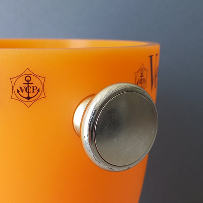 A French vintage Veuve Clicquot thick plastic champagne cooler in a wonderful shade of vibrant yellow-orange. Veuve Clicquot are from Reims, France (founded in 1772) and is one of the premier champagne manufacturers in the world so this piece will serve as a nice practical collectible.