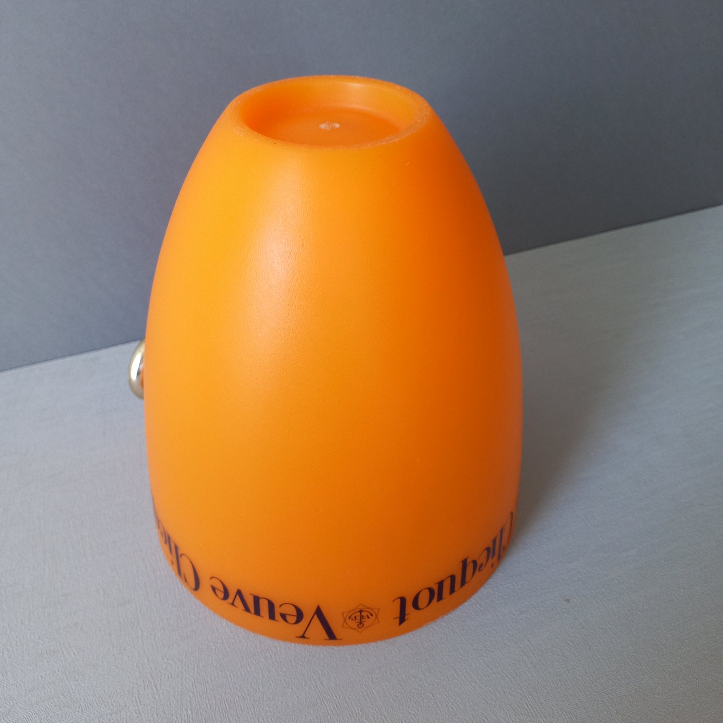 A French vintage Veuve Clicquot thick plastic champagne cooler in a wonderful shade of vibrant yellow-orange. Veuve Clicquot are from Reims, France (founded in 1772) and is one of the premier champagne manufacturers in the world so this piece will serve as a nice practical collectible.