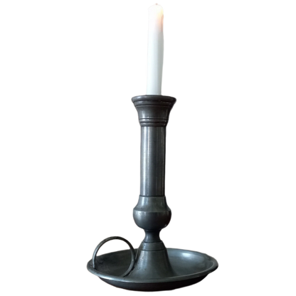 A handsome French vintage pewter candle holder / chamber stick that makes excellent home decor. This chamber stick is taller than similar ones we usually find. Underneath is marked with the manufacturer's stamp - a great looking piece!